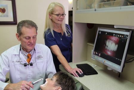 assistant-viewing-dental-crown with dr crabtree